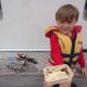 Max with his rubbish gathered from a beach