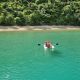 rowing to the beach in the tender