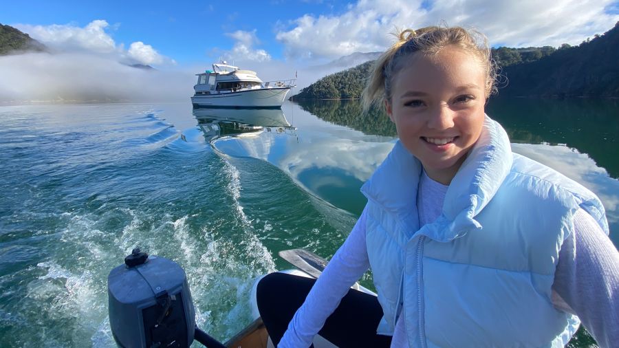Maia driving the tender away from the boat